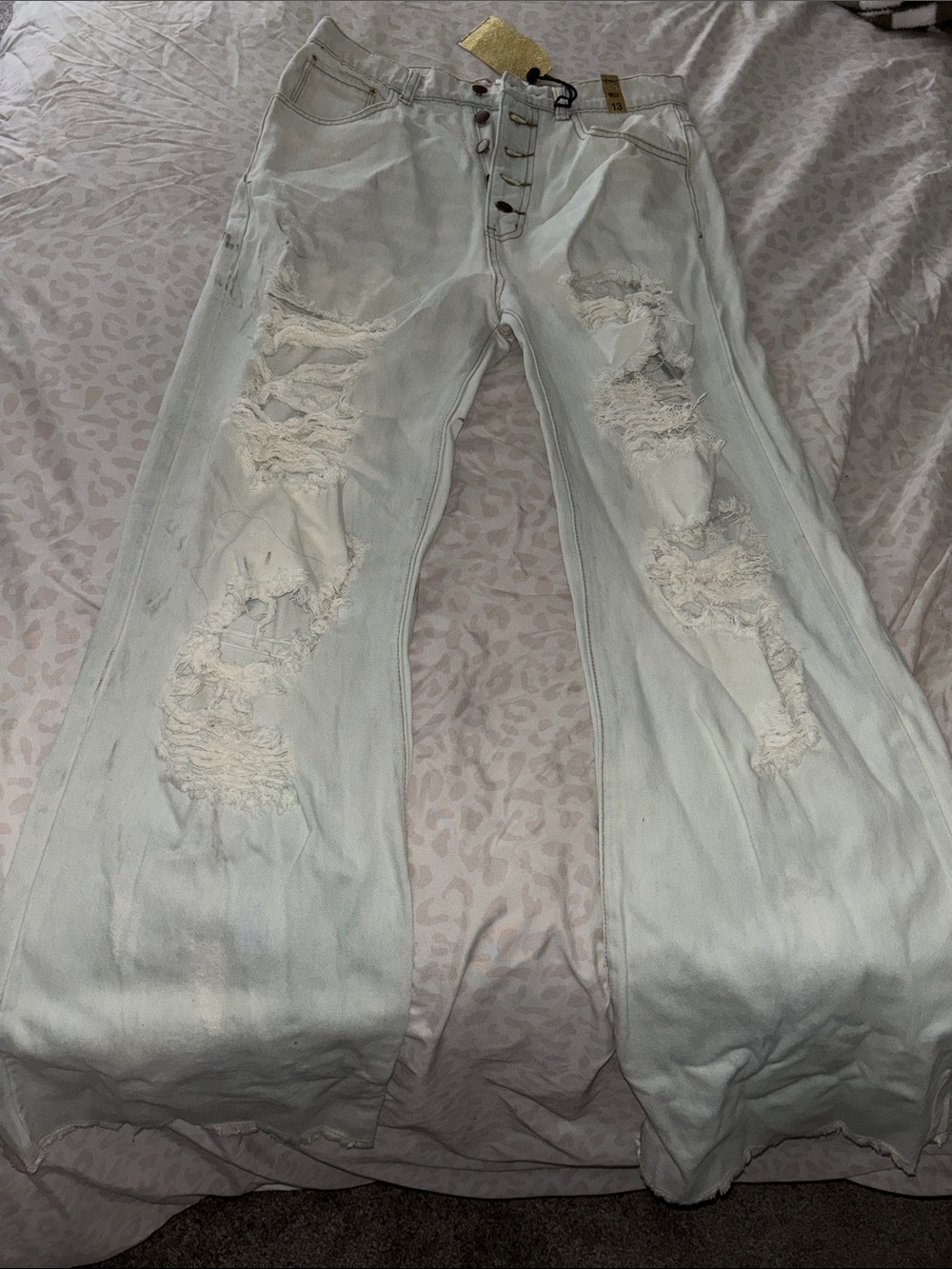 Vibrant Light Blue Distressed Flare Jeans